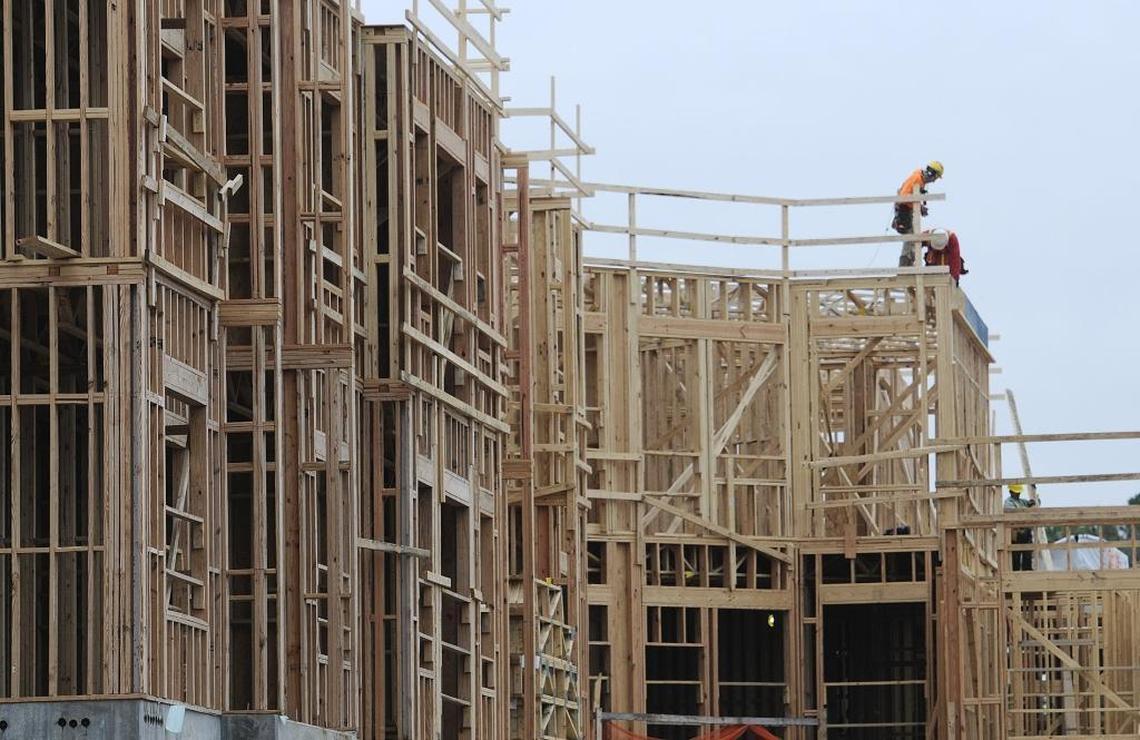 Apartment construction at the corner of Stonewall and McDowell streets on Dec. 5, 2014.