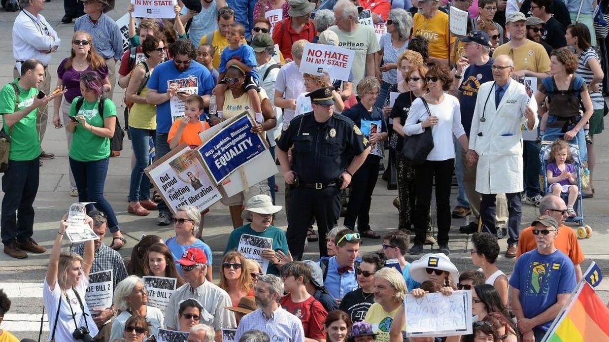 Protesters head into the Legislative building for a sit-in against House Bill 2 in Raleigh, N.C., Monday, April 25, 2016.