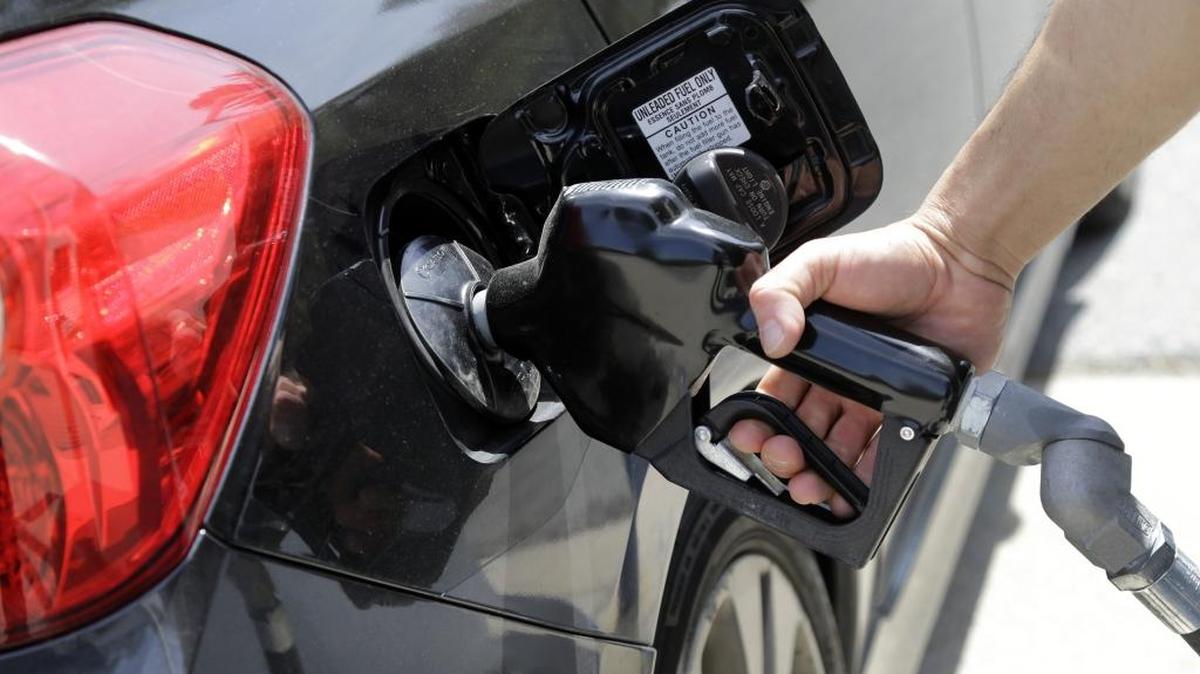 A Massachusetts gas station attendant pumps gas in this May 2015 file photo.