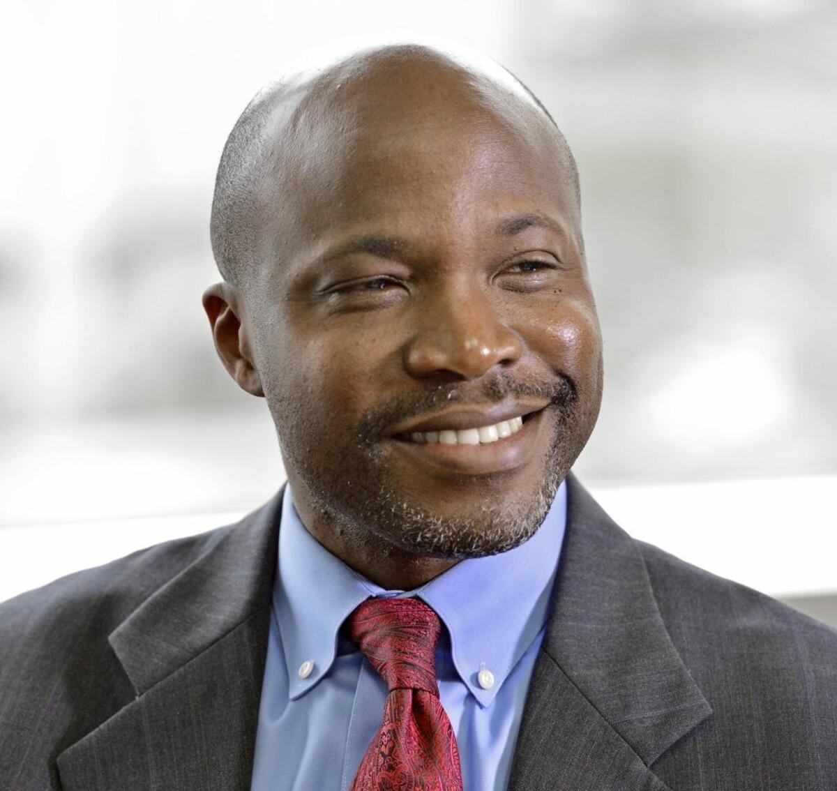 Charlotte planning director Taiwo Jaiyeoba is considering implementing impact fees, which are levied on new development to help pay for schools, parks and transit infrastructure. 