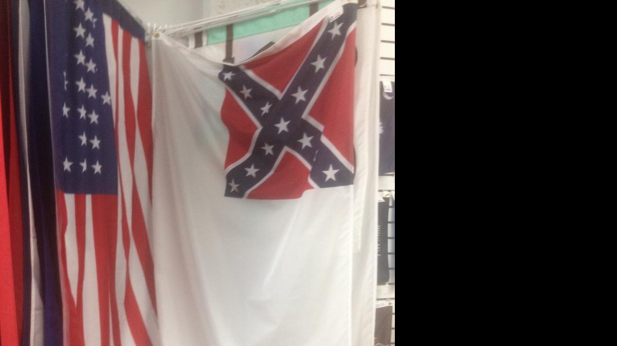 
One of the two Confederate flags left in Bob’s Flag in Pineville. This flag is known as the second national flag of the Confederate States of America. 

