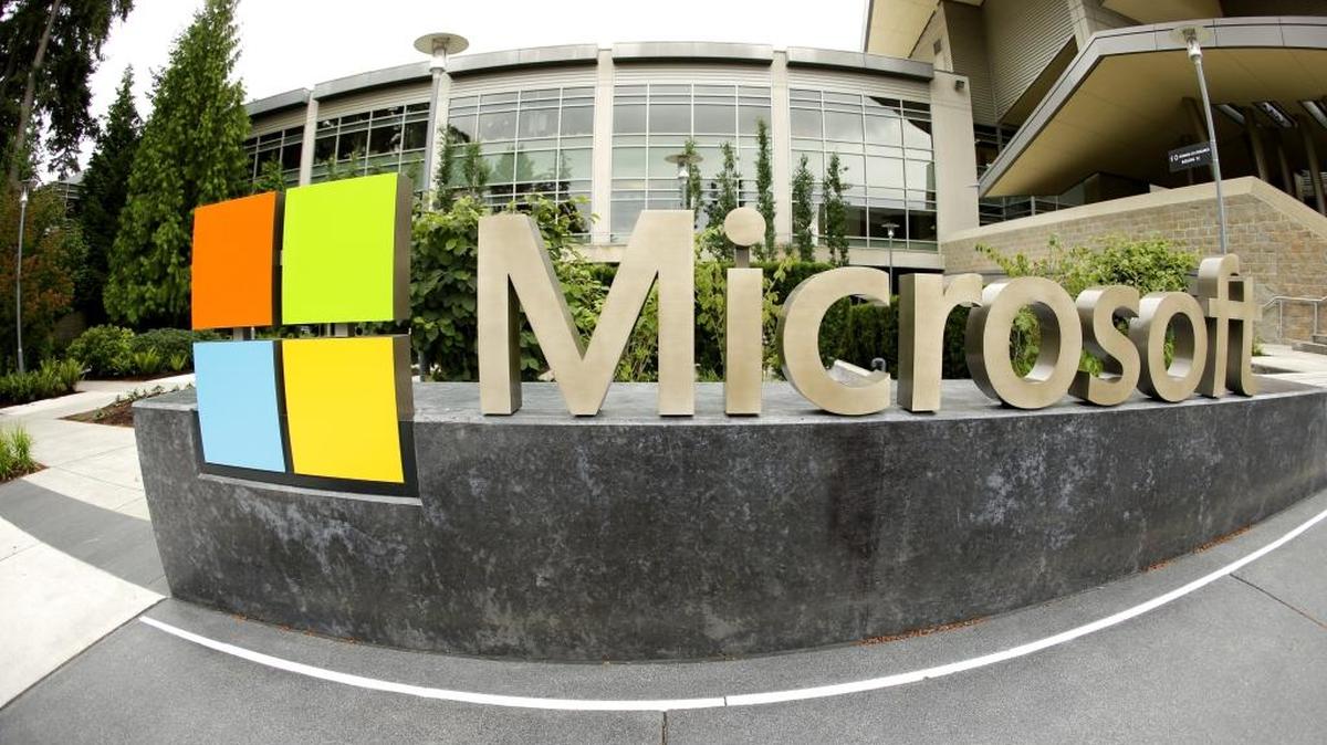 
Microsoft Corp. signage outside the Microsoft Visitor Center at company headquarters in Redmond, Wash. Microsoft, which employs about 1,100 in its offices off Arrowood Road in Charlotte, last month said it was lengthening its parental leave policy to 12 weeks, fully paid, effective Nov. 1. 
