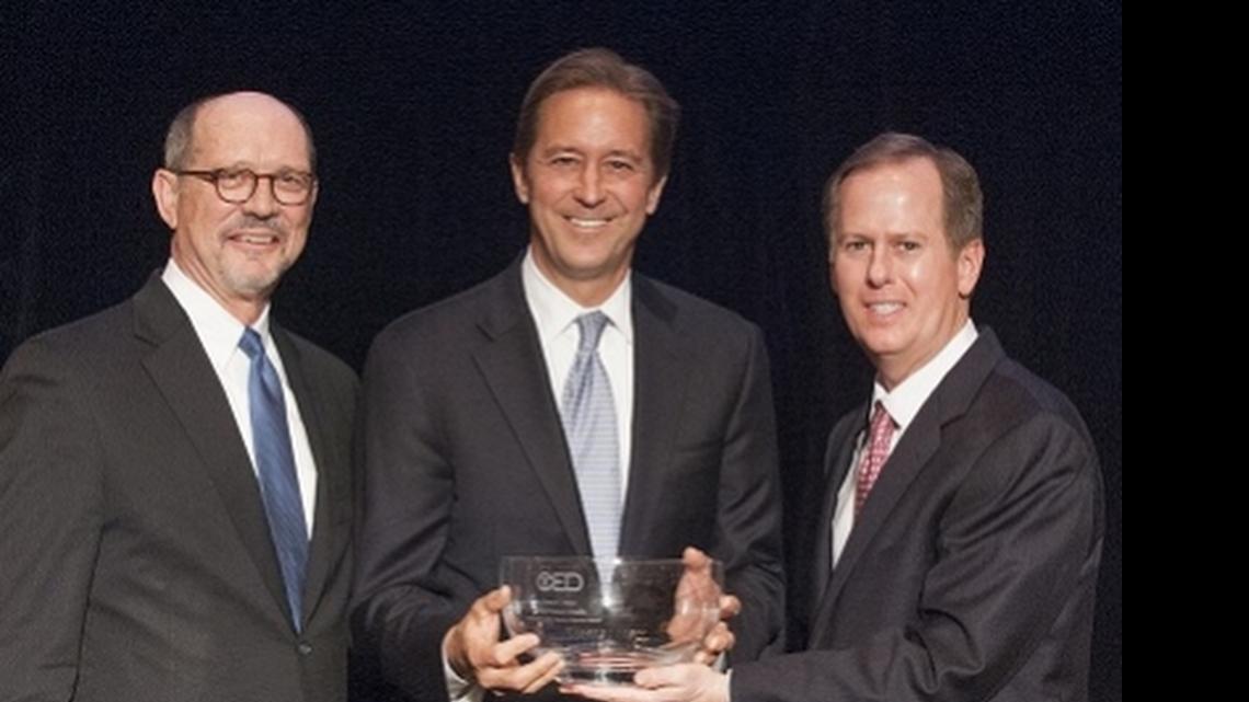 
The Committee for Economic Development honored Charlotte-based National Gypsum’s CEO Tom Nelson, center, with its Leadership in the Nation’s Interest award in April. 
