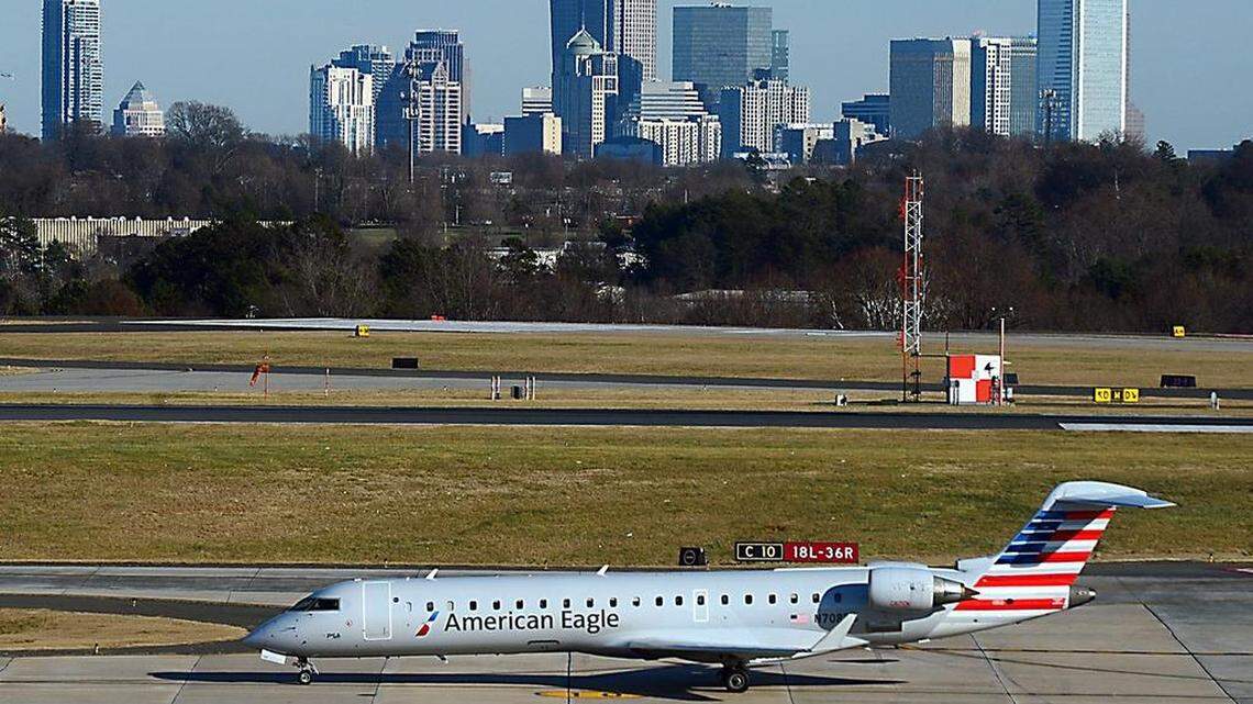 An American Eagle jet taxis to the terminal at Charlotte Douglas International Airport.