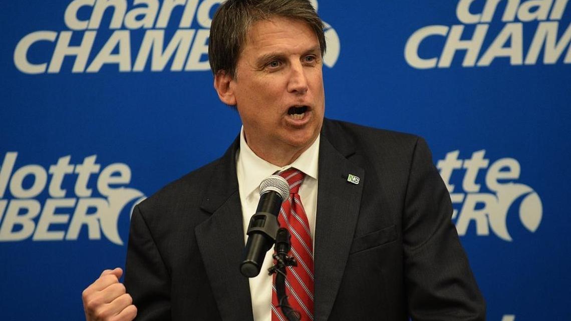 Gov. Pat McCrory clenches his fist as he announces at the Charlotte Chamber of Commerce that PayPal, Inc. will open a Global Operations Center in Charlotte, creating 400 new jobs. PayPal backed out of the plan in opposition to House Bill 2, which McCrory signed into law March 23.