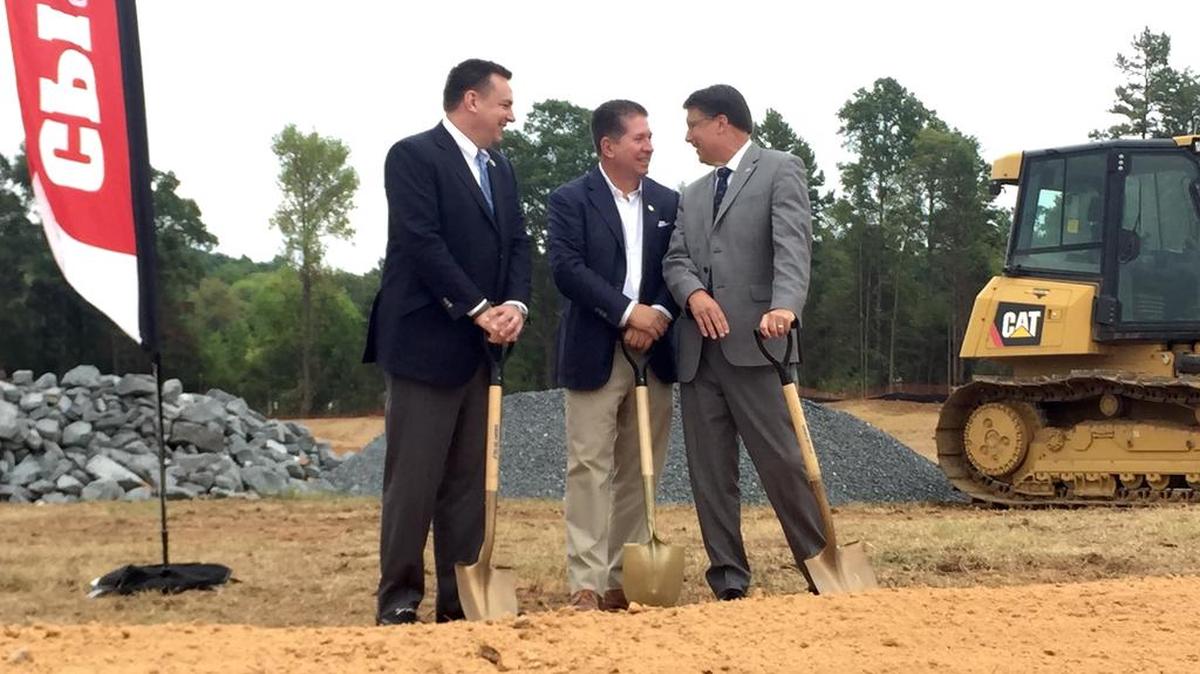 
N.C. Gov. Pat McCrory (right) talks to CPI founder and CEO Ken Gill (center) and U.S. Rep. Richard Hudson at the groundbreaking ceremony Friday at the company’s headquarters on Sandy Porter Road.
