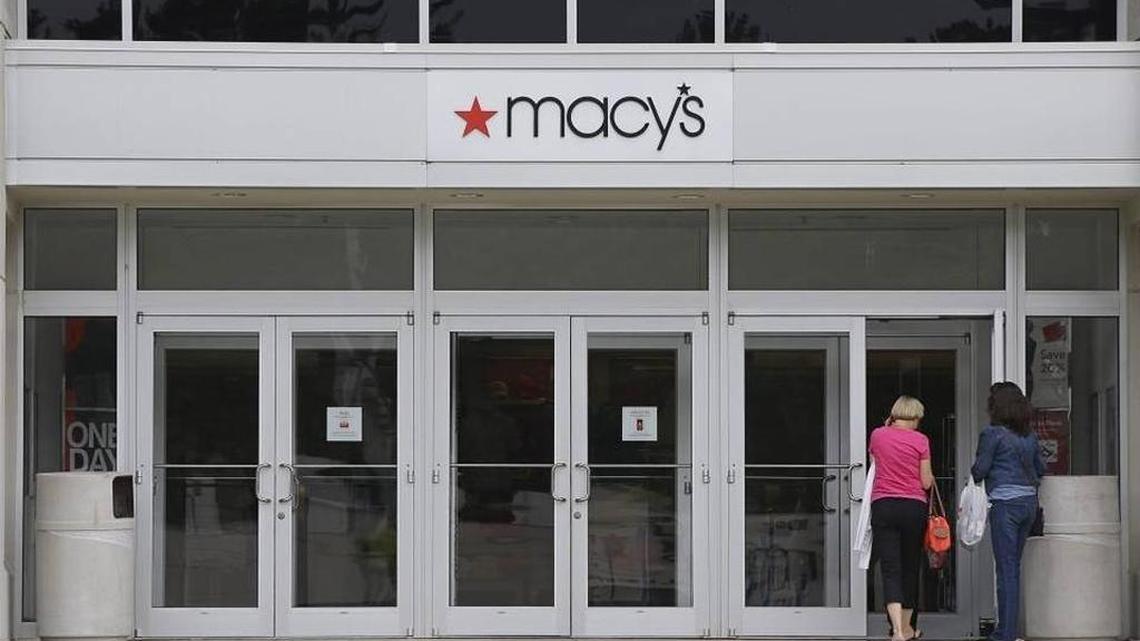 In this July 10, 2015, file photo, shoppers walk into a Macy's department store at the Hanover Mall in Hanover, Mass.