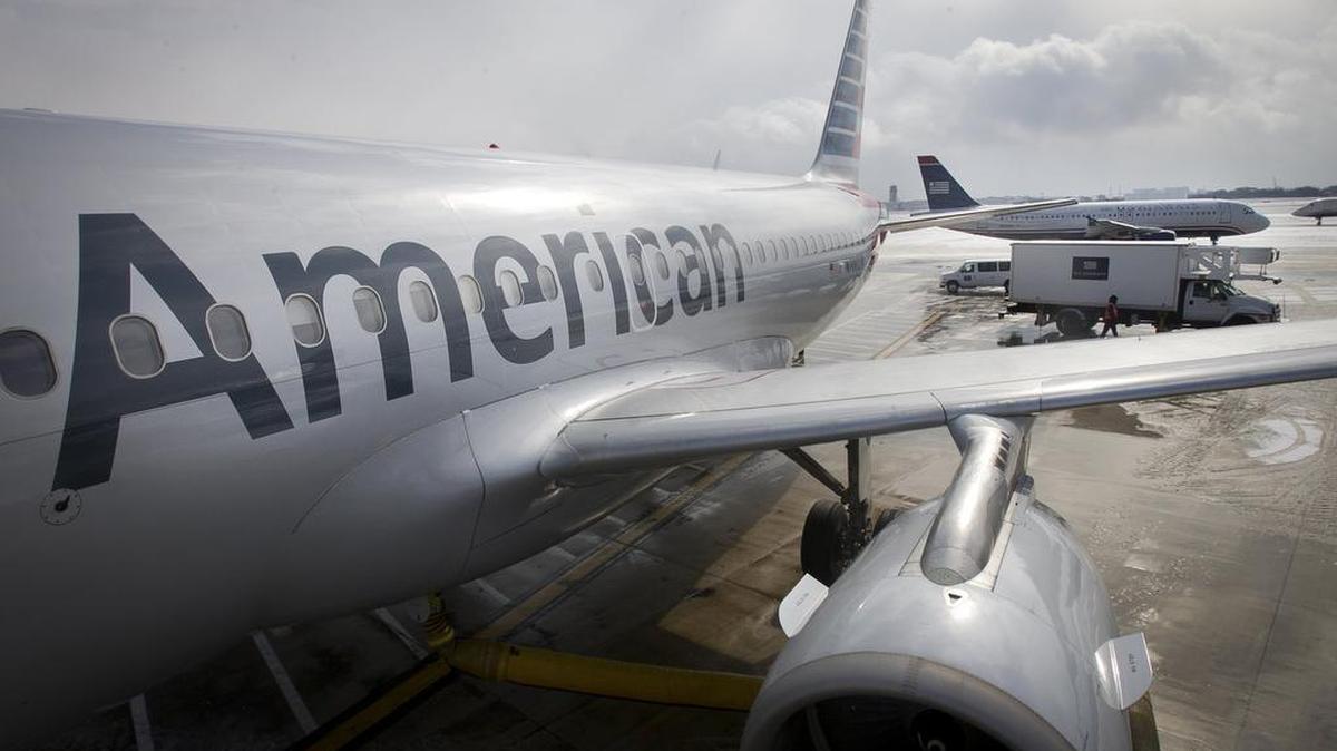 
An American Airlines Flight Airbus A319 is parked at a gate at Philadelphia International Airport. The airline says it is investigating whether hackers entered its computers.
