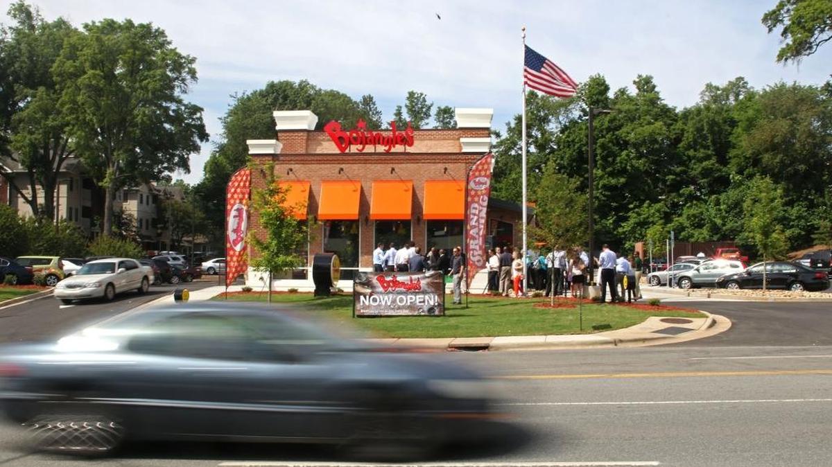 Charlotte-based Bojangles’ has been ordered to pay $15,000 to settle a sexual harassment and retaliation lawsuit from a transgender former employee at one of its restaurants in Fayetteville.