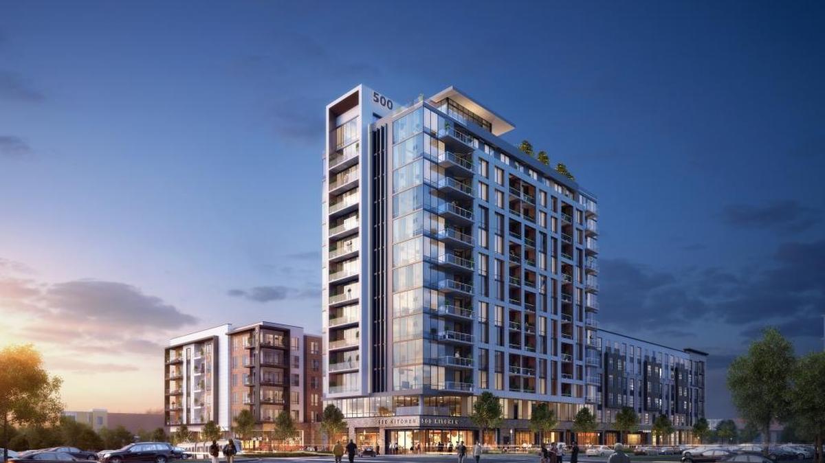 A rendering of the planned apartment building, with a 14-story tower and mid-rise portion, at 500 West Trade Street.