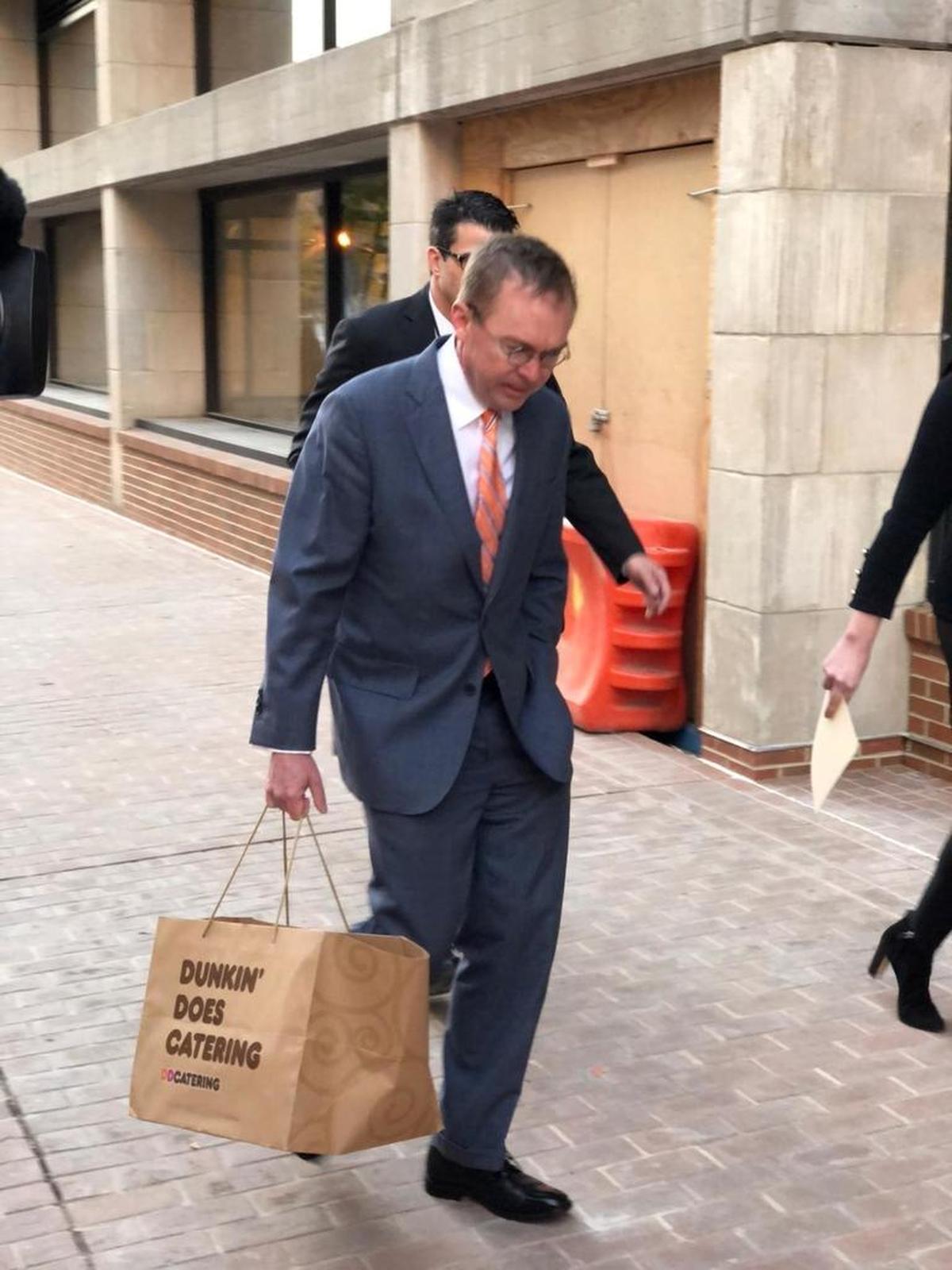 Mick Mulvaney, named acting director of the Consumer Financial Protection Bureau by the Trump administration, brought doughnuts when he arrived for work on Monday in Washington.