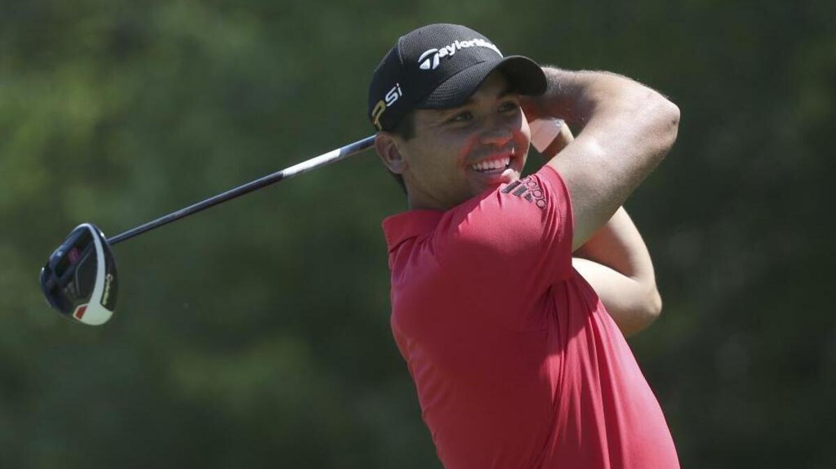 Jason Day smiles as he warms up on the sixth tee during a practice round for the PGA Championship golf tournament at Baltusrol Golf Club in Springfield, N.J., Wednesday, July 27, 2016.