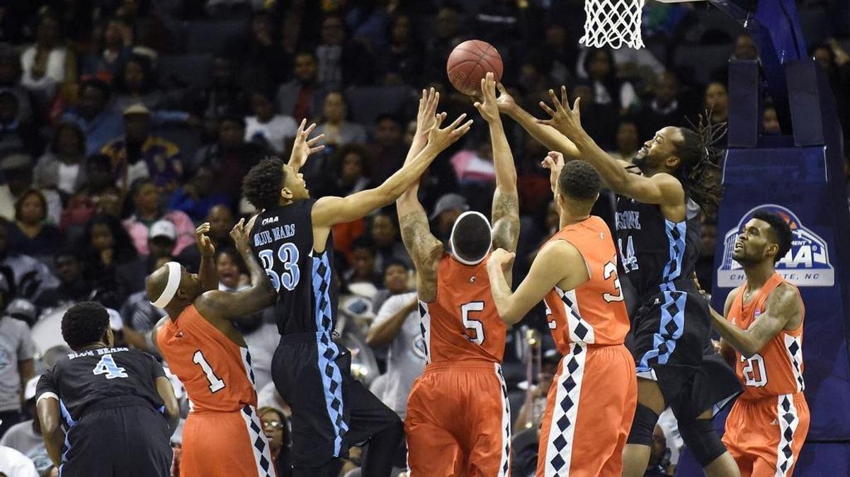 Livingstone's Jimmy Wilson, #33 and Nasir Austin, #44 battle for a rebound in the second half. Virginia State University maintained a lead over Livingstone College in the second half of the CIAA men’s championship game in uptown Charlotte on Feb. 27, 2016.