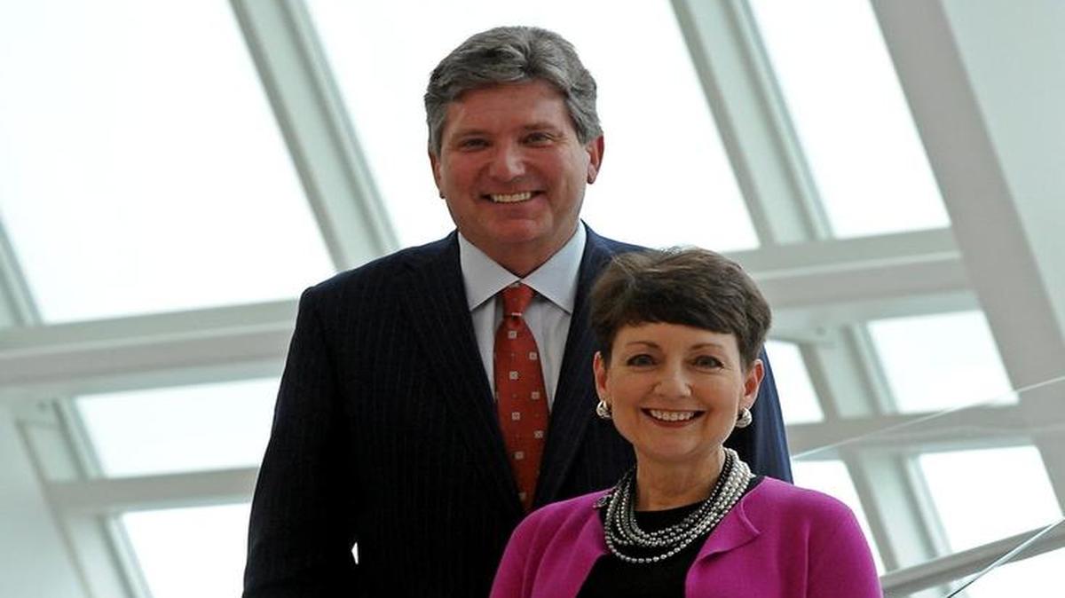 Piedmont Natural Gas chairman and CEO Thomas Skains, left, and Duke Energy CEO Lynn Good, right, on Monday, October 26, 2015. Duke Energy will buy Piedmont Natural Gas for $4.9 billion in cash. The deal is expected to close by the end of 2016.