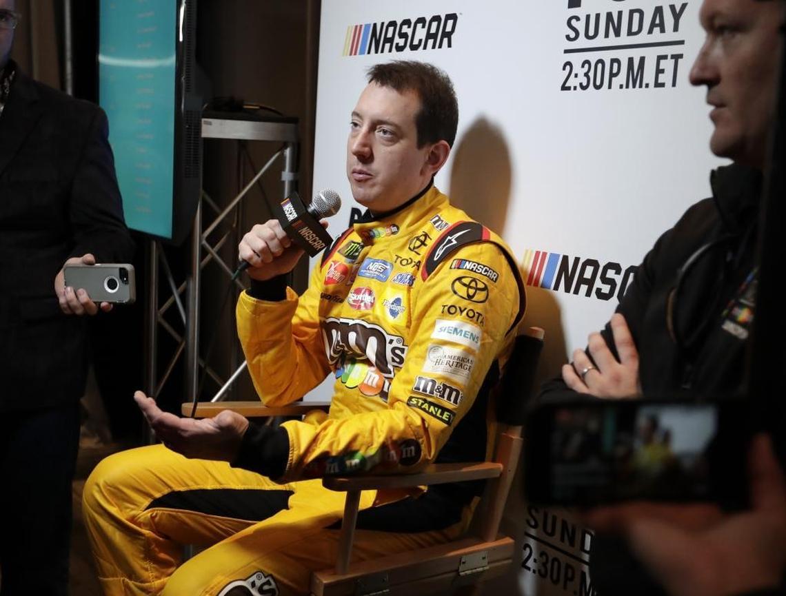 Kyle Busch answers questions during an interview at media day for the NASCAR Daytona 500 auto race at Daytona International Speedway Wednesday.