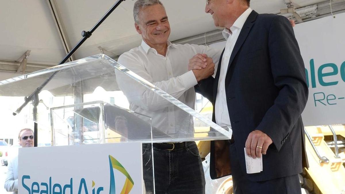 From left, Jerome Peribere, president and CEO of Sealed Air, and Gov. Pat McCrory at the groundbreaking ceremonies for the Sealed Air global corporate headquarters on June 25,2015.