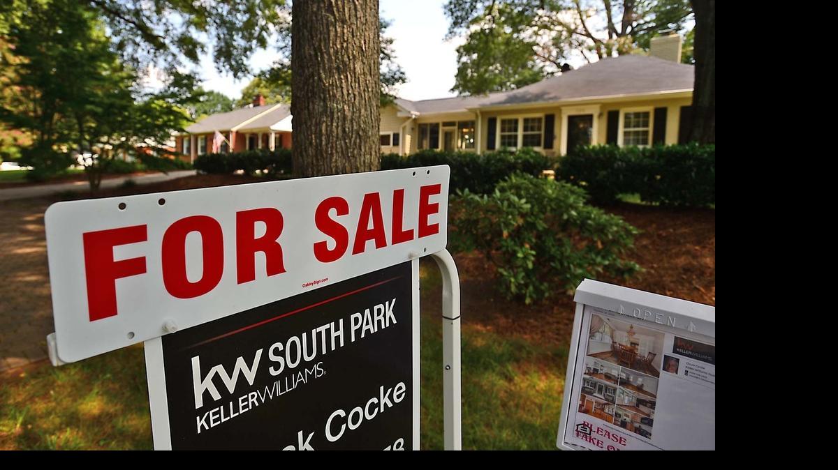 
A home for sale in the Sedgefield neighborhood in Charlotte in August 2014. Home prices in the Charlotte area rose 5.4 percent in February over the last year, representing a rise of 0.9 percent from January. Nationally, prices rose 5 percent, according to a report Tuesday. 
