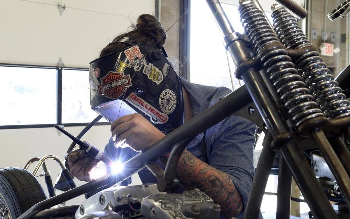Mitch Johnson, a fabricator with Prism Supply Company, works on one of several motorcycles being built at the business in Camp North End. Camp North End is a 75 acre redevelopment on Statesville Avenue where Ford Model Ts were built and Hercules missiles were assembled into what the developers call an “adaptive reuse project” that is becoming “ a catalytic hub of innovation and ideas”. Numerous industrial buildings have more than 1,000,000 square feet of space “for work, artistic expression, dining and hospitality, entertainment, recreation and community building.” We went on a tour of Camp North End on Tuesday, Jan. 23, 2018.
