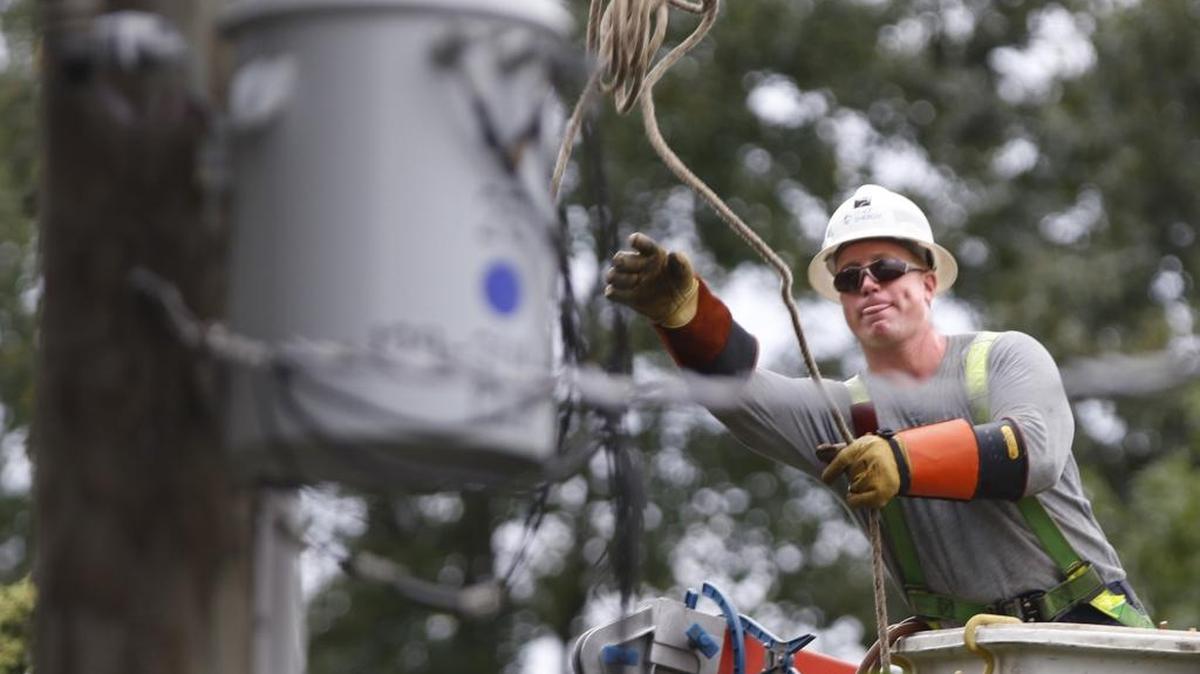 The Department of Energy has granted $18.5 million to North Carolina to help make the state’s electric grid more resilient. Here, a Duke Energy lineman is shown making repairs after a 2016 tropical storm, the kind of event during which the federal agency intends to boost the grid.