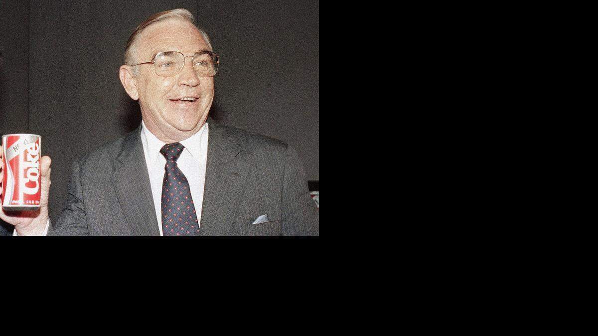 
FILE - In this April 23, 1985 file photo, Donald R. Keough, then Coca-Cola Co. President and Chief Operating Officer, toasts New Coke after a presentation at Lincoln Center in New York. Coca-Cola says Keough, who steered the company through the “cola wars” of the 1980s, died Tuesday, Feb. 24, 2015 in Atlanta. He was 88. (AP Photo/Marty Lederhandler, File)

