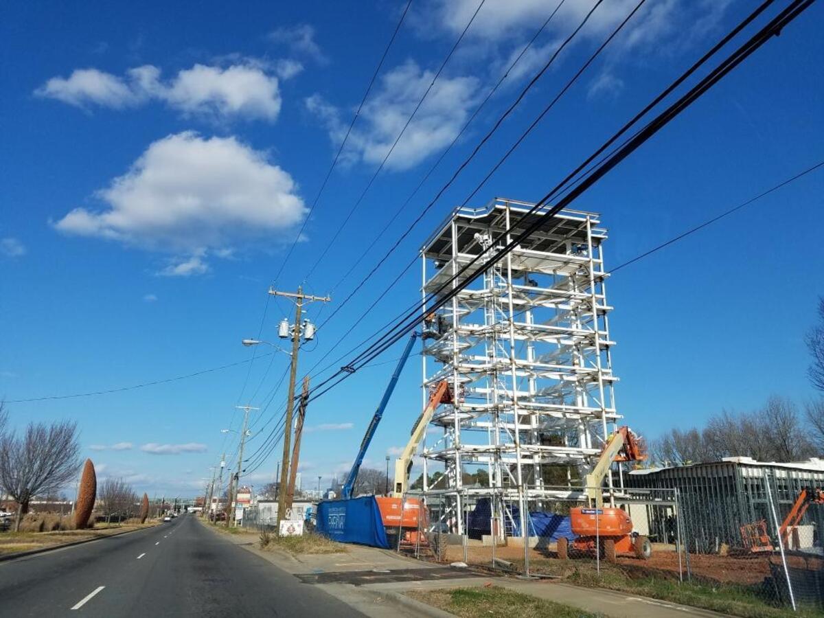 Carvana construction underway on South Boulevard on Tuesday, Dec. 12, 2017. The Blue Line public art is visible on the left, where the light rail runs in the median of South Boulevard near Scaleybark Station.