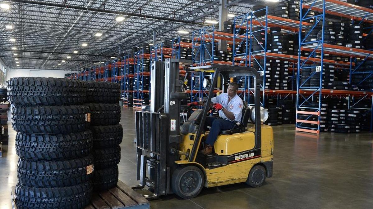 As part of a major restructuring, American Tire Distributors has laid off approximately 100 employees at its corporate headquarters in Huntersville.