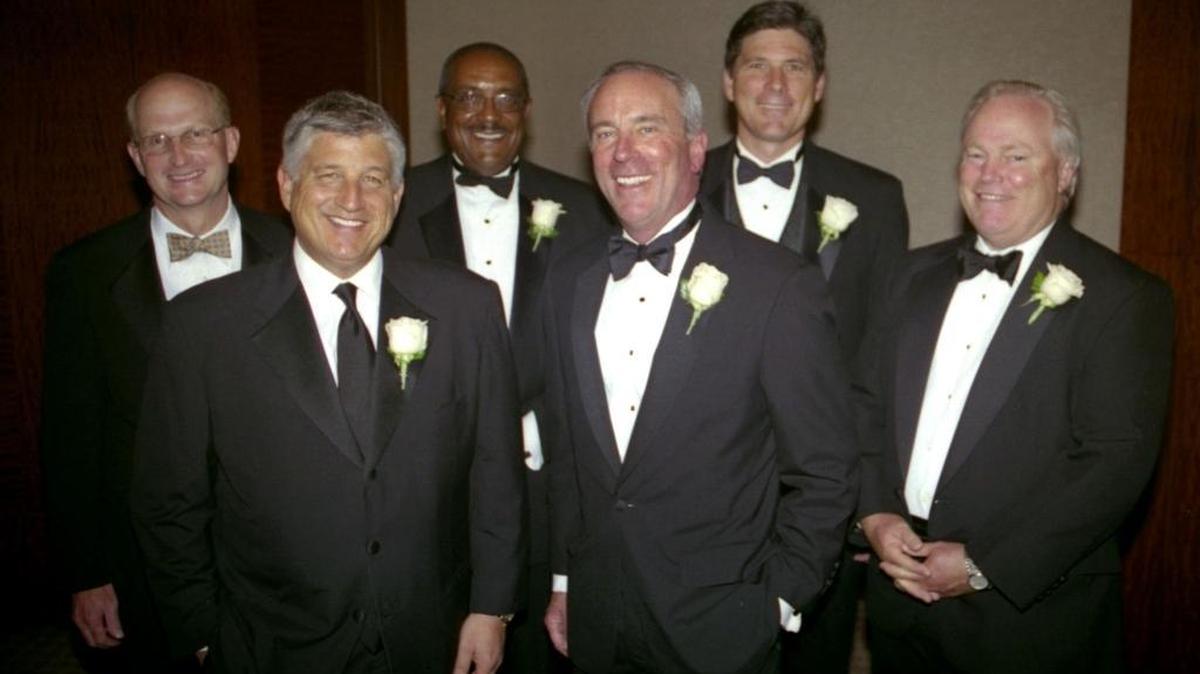 Rick Siskey, second from left, was widely viewed as a Charlotte entrepreneurial success story, with a successful financial firm, a namesake YMCA branch and a showpiece home. Here he joins fellow recipients of a Father of the Year award during a 2007 fundraiser for the American Diabetes Association at the Westin hotel. From left: Hank Flint, Siskey, Milton Jones, Chris Kearney, Phil Walton and John Tate.