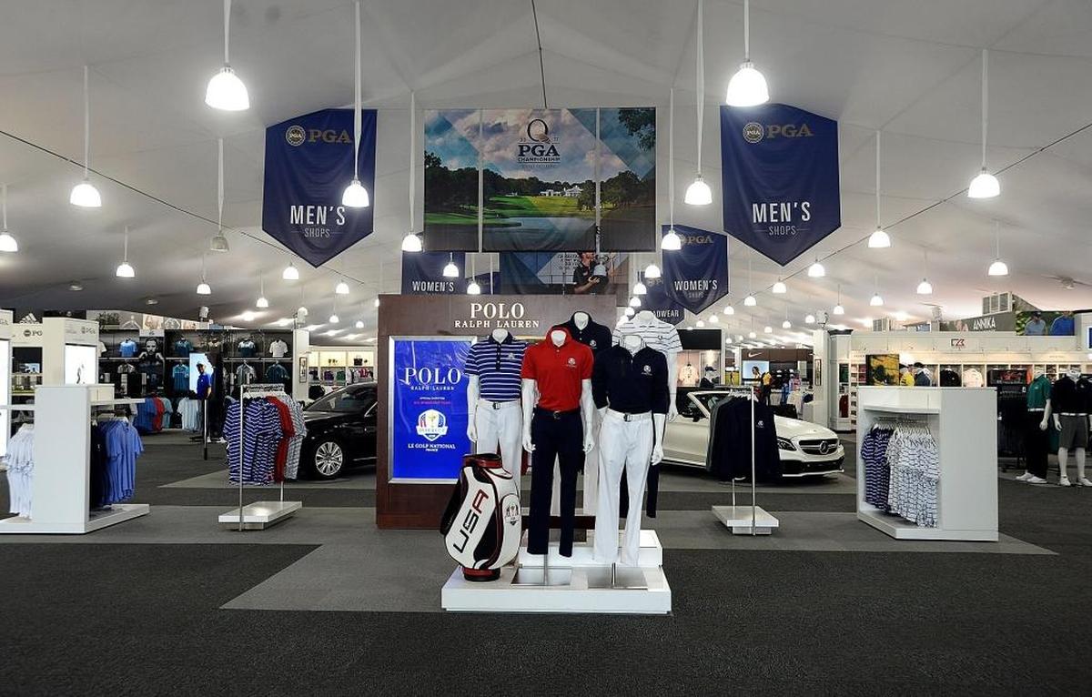 Clothing, accessory and automobile displays at The Championship Shops, a new merchandise tent area at Quail Hollow Club for the PGA Championship.