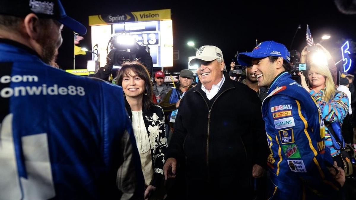 (L-R) NASCAR Sprint Cup Series driver Dale Earnhardt Jr., Linda Hendrick, Rick Hendrick and driver Chase Elliott laugh together prior to the first can-am duel qualifying race at Daytona International Speedway on Feb. 18, 2016. Earnhardt Jr. would win the race ahead of Joey Logano.