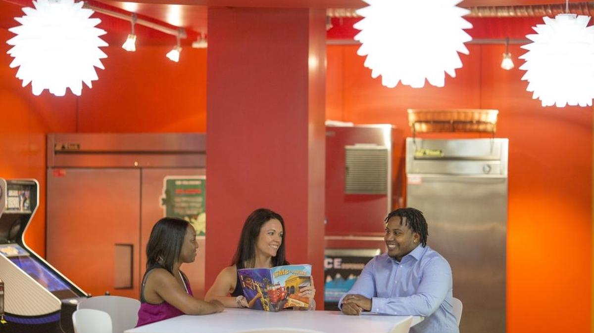 Quicken Loans employees sit in a break room inside the SouthPark location. The financial services firm was named the No. 2 Top Workplace for midsize companies in the Charlotte region in 2015.