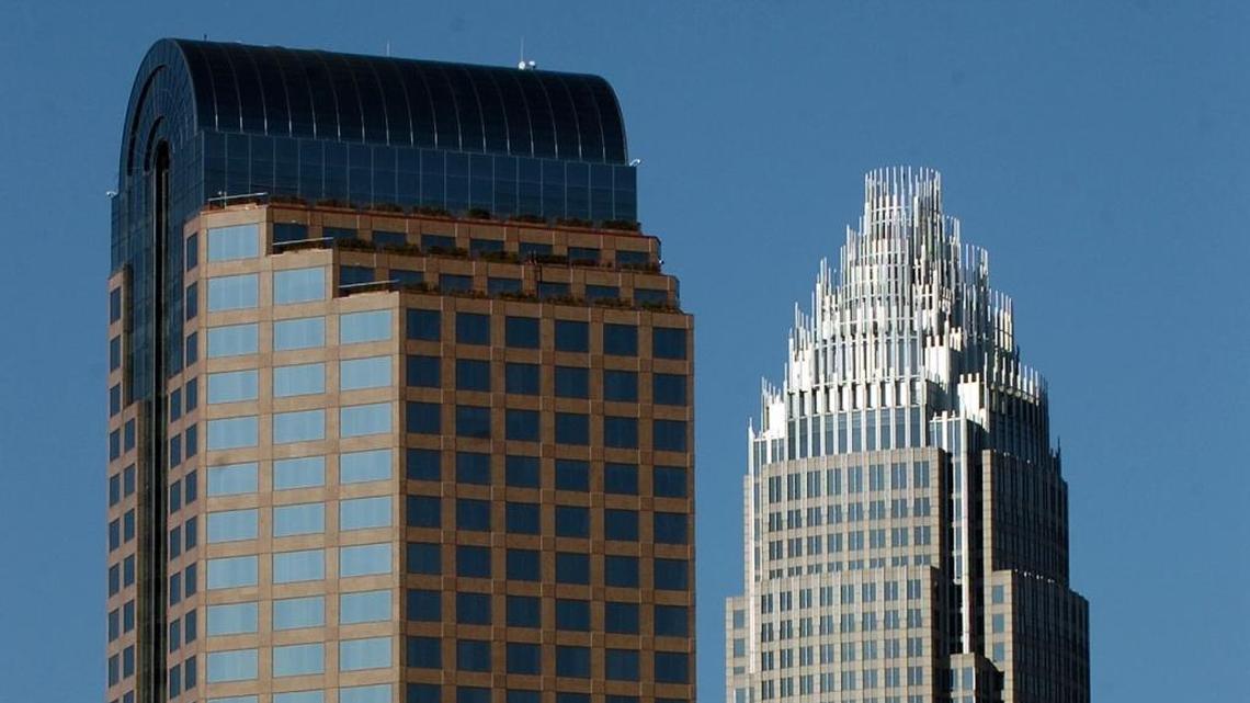Bank towers dominate Charlotte’s skyline. At left: One Wells Fargo, formerly owned by Wachovia. At right: Bank of America’s headquarters tower.