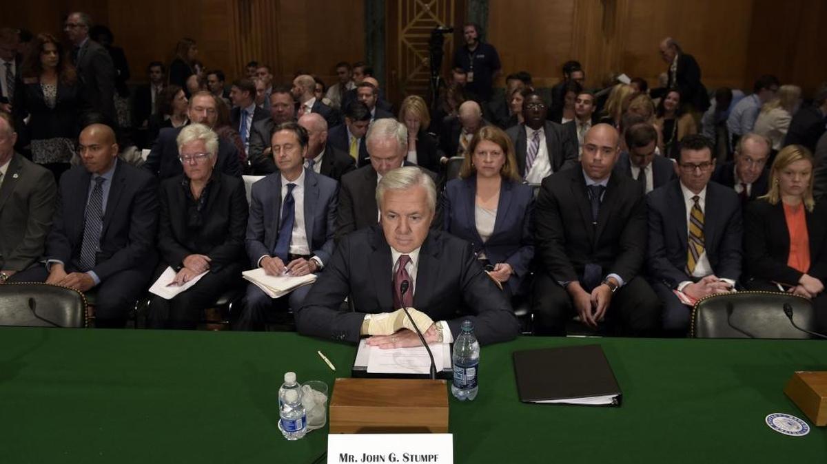John Stumpf, then-CEO of Wells Fargo, prepares to testify before the Senate Banking Committee in September.