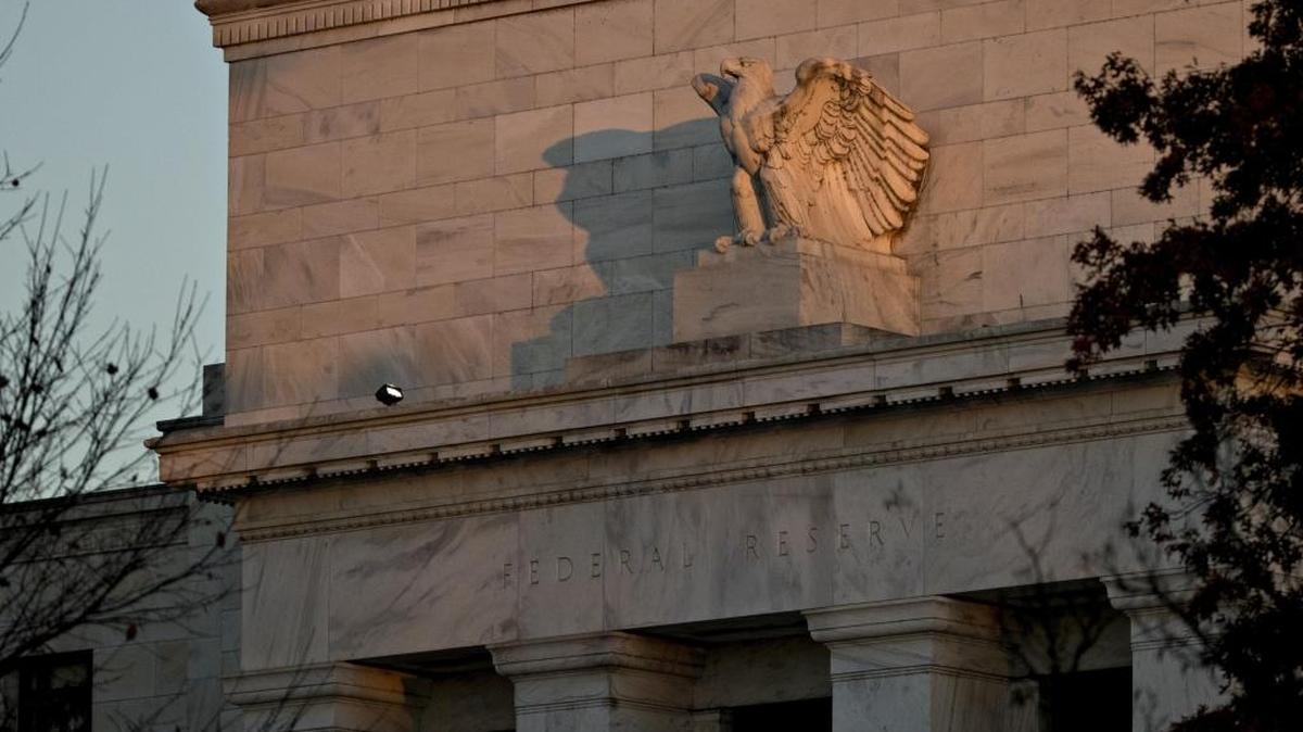 An eagle sculpture stands on the facade of the Marriner S. Eccles Federal Reserve building in Washington on Nov. 18, 2016.
