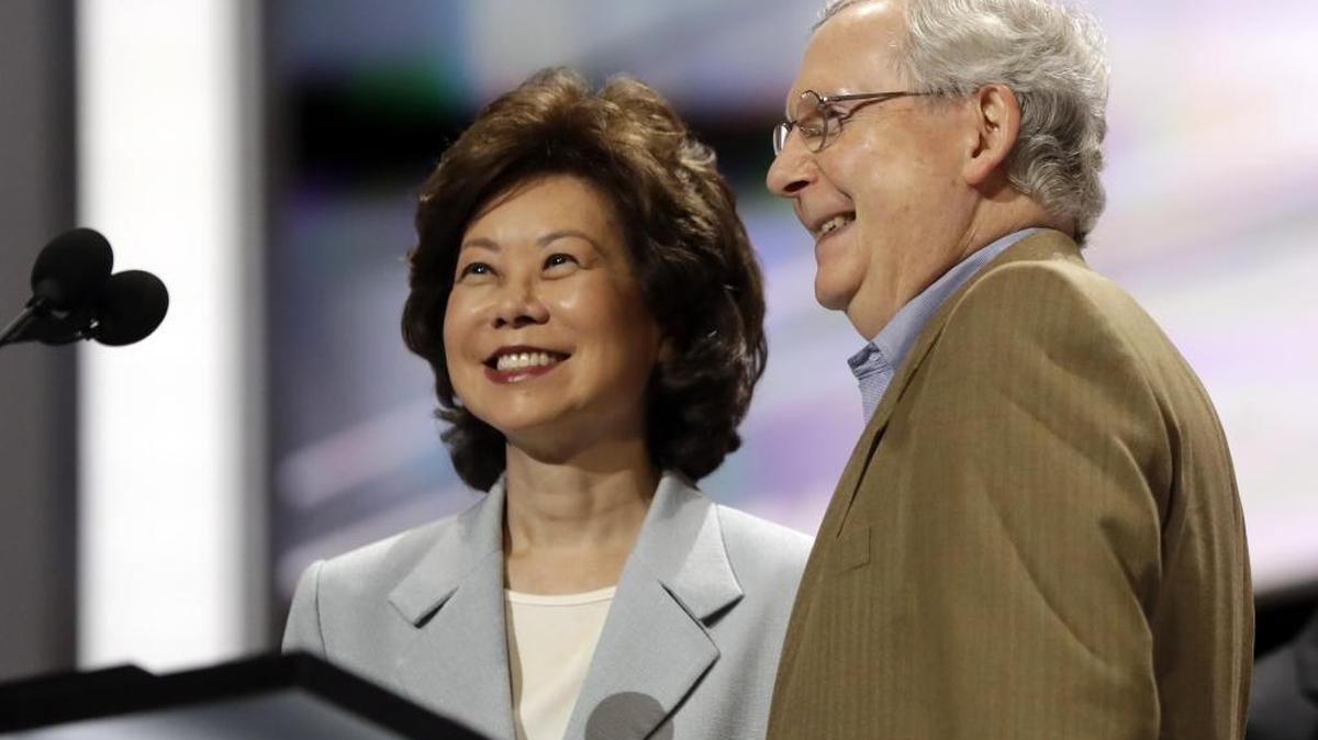 In this July 2016 file photo, former Labor Secretary Elaine Chao and her husband, Senate Majority Leader Mitch McConnell, R-Ky., check out the stage during preparation for the Republican National Convention inside Quicken Loans Arena in Cleveland.