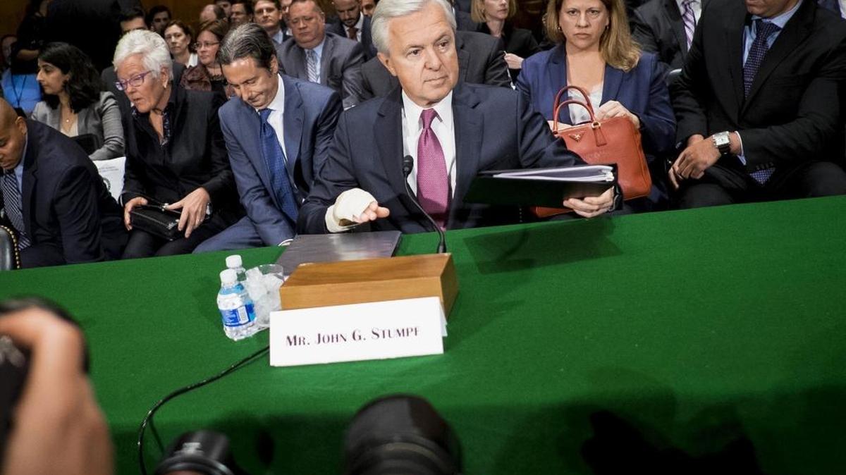 Wells Fargo CEO John Stumpf arrives to testify before the Senate Committee on Banking, Housing, and Urban Affairs in Washington Tuesday.