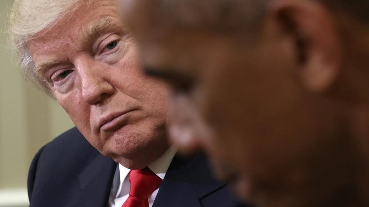 U.S. President Barack Obama speaks while meeting with President-elect Donald Trump (L) following a meeting in the Oval Office last week.