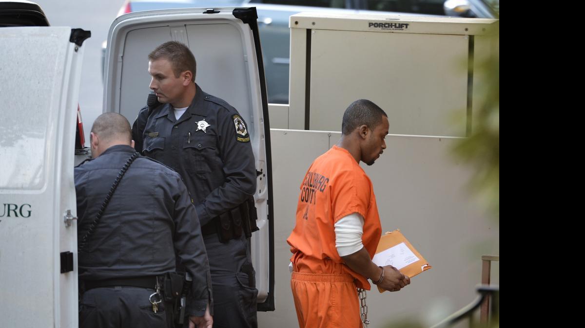 
James Tyson Jr. enters the federal courthouse in Charlotte Tuesday morning. Tyson was one of four defendants being sentenced Tuesday in the long-running Operation Wax House mortgage fraud case.
