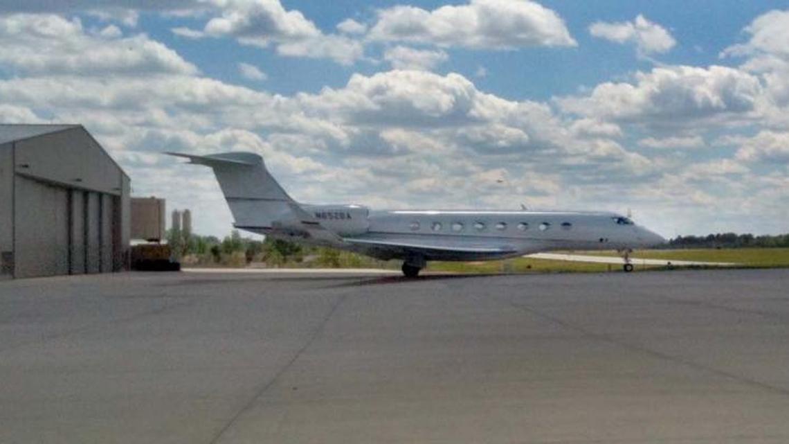 A corporate jet registered to Bank of America sits on the tarmac Wednesday outside a hangar at Charlotte Douglas International Airport.