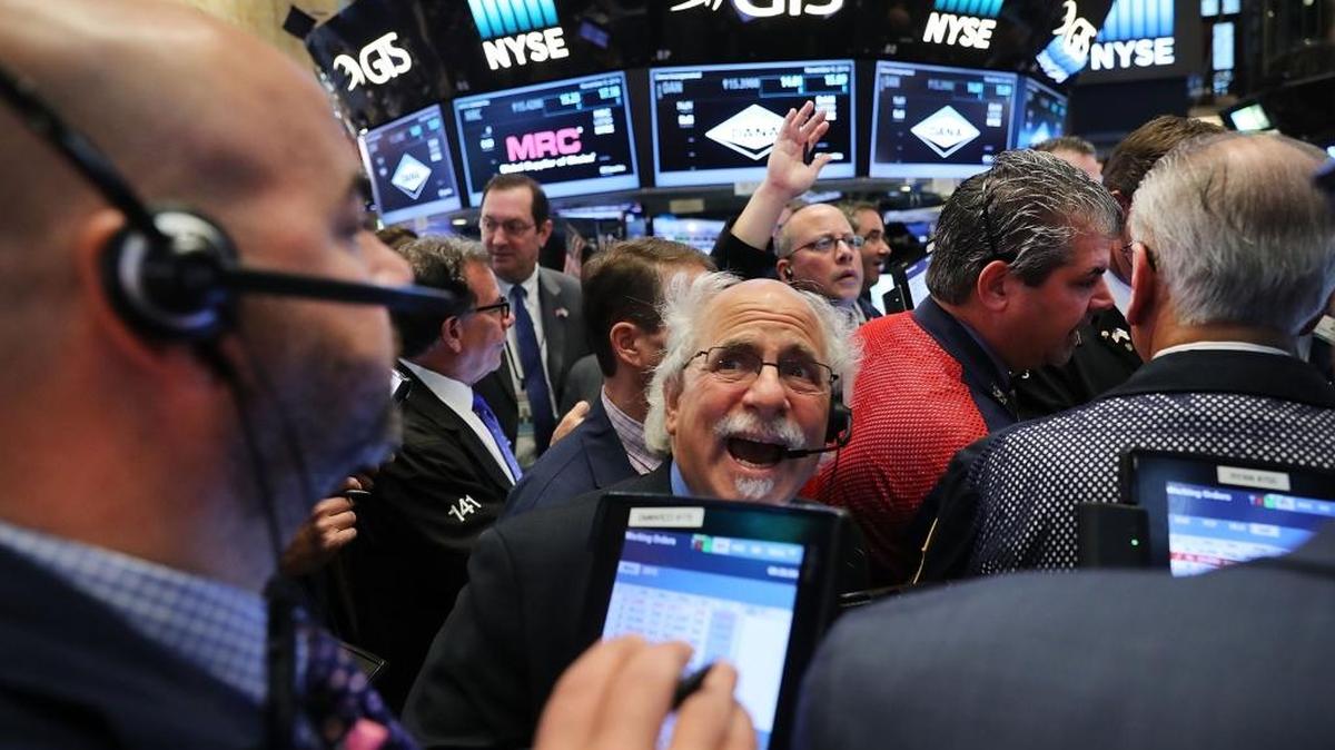 Traders work on the floor of the New York Stock Exchange the morning after Donald Trump won a major upset in the presidential election.