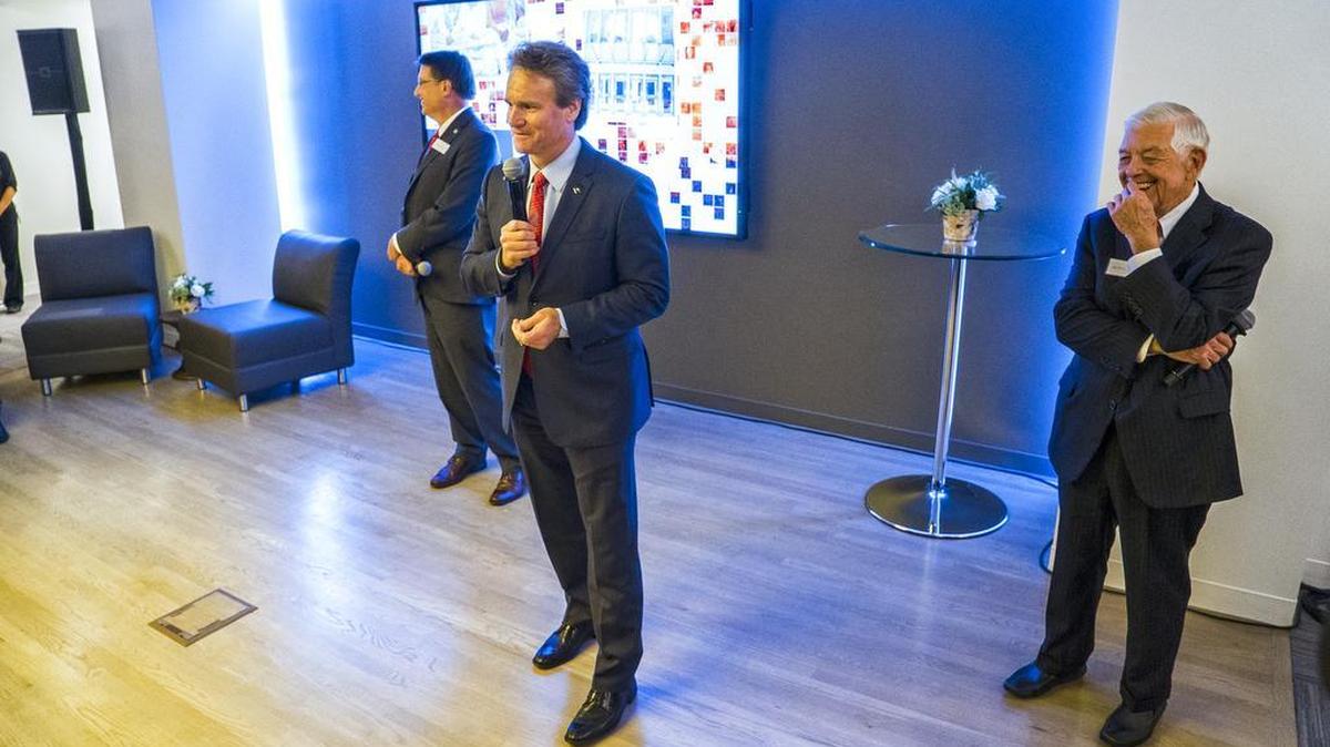 Succession is in the spotlight at big banks after Wells Fargo named a new president. Here Bank of America CEO Brian Moynihan, center, speaks at the grand opening of the Founders Room in Founders Hall. Former Bank of America CEO Hugh McColl, right, was honored for his contributions to the arts and Gov. Pat McCrory, left, also spoke.