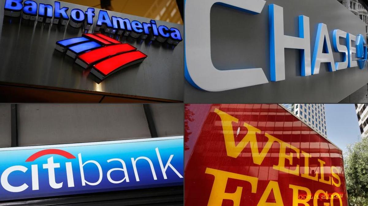 This file photo combination shows bank branches of, clockwise from top left, Bank of America, Chase, Wells Fargo, and Citibank. The impact of low oil prices has continued to hobble the finances of U.S. banks, which posted increased loan losses in the first quarter of 2016 driven by a huge jump in delinquent energy loans, data issued Wednesday by the Federal Deposit Insurance Corp. showed.