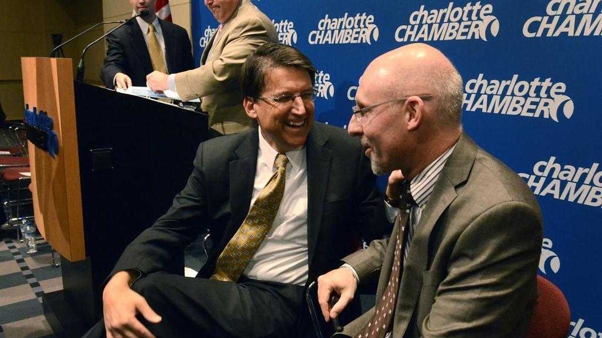 Gov. Pat McCrory (center) speaks with MetLife executive Eric Steigerwalt in 2013, when the insurer announced plans to create hubs in Charlotte and Cary in exchange for more than $87 million in taxpayer-funded incentives. Earlier this year, MetLife prepared ‘talking points’ at McCrory’s request to respond to media inquiries regarding a planned separation by the insurer from the Charlotte business, emails show. McCrory never used the points, a McCrory spokesman told the Observer. But the Commerce Department used some of them nearly verbatim in responses to Observer questions.