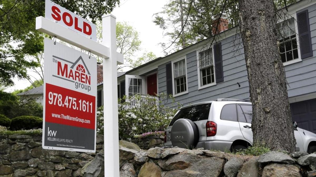 A “sold” sign in front of a house in Andover, Mass. Some analysts expect the British vote to exit the European Union will push U.S. mortgage rates to historic lows.
