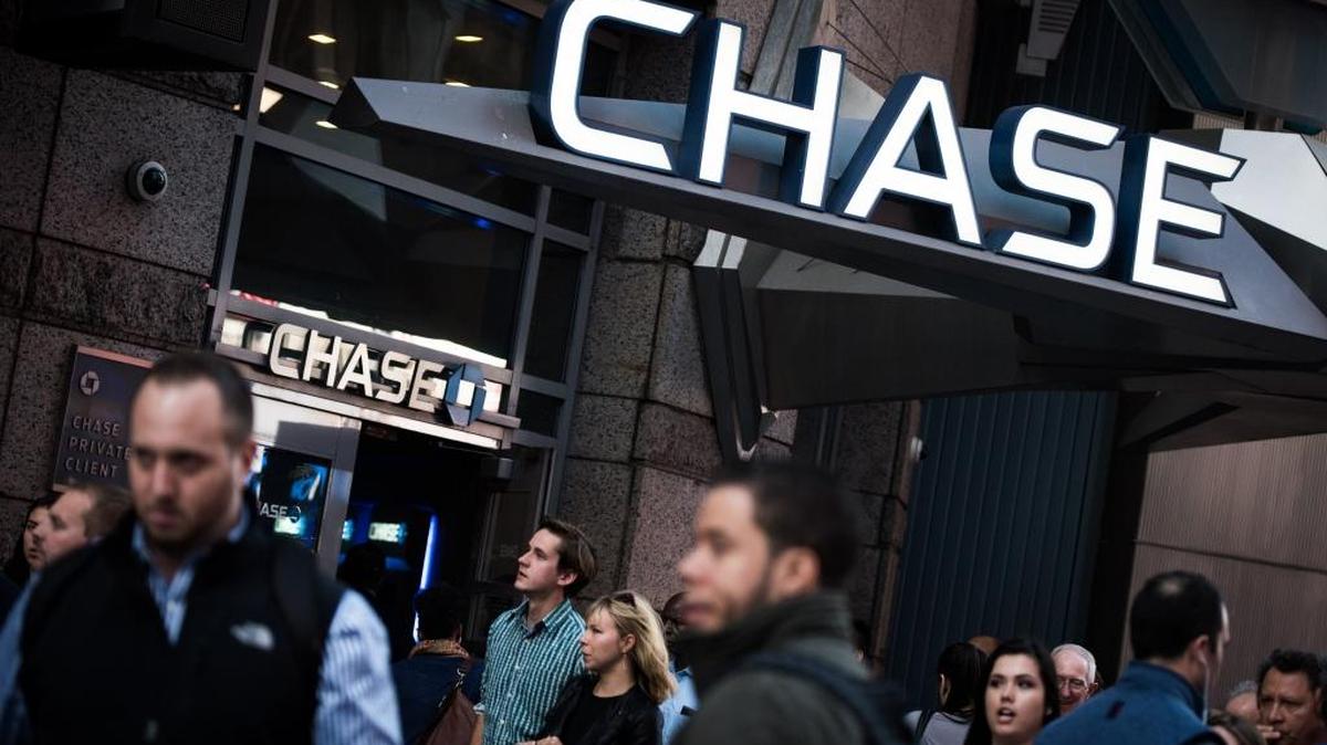 Pedestrians walk past a JPMorgan Chase bank branch in New York.