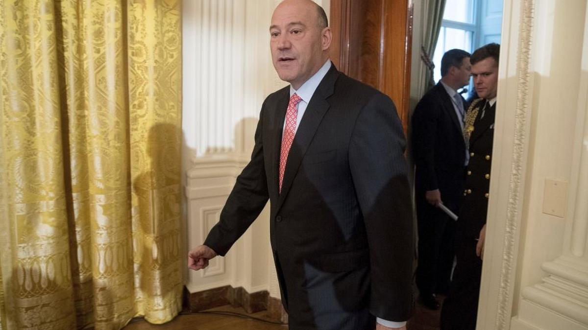 In this file photo, National Economic Council chairman Gary Cohn arrives for a White House senior staff swearing-in ceremony in the East Room of the White House.