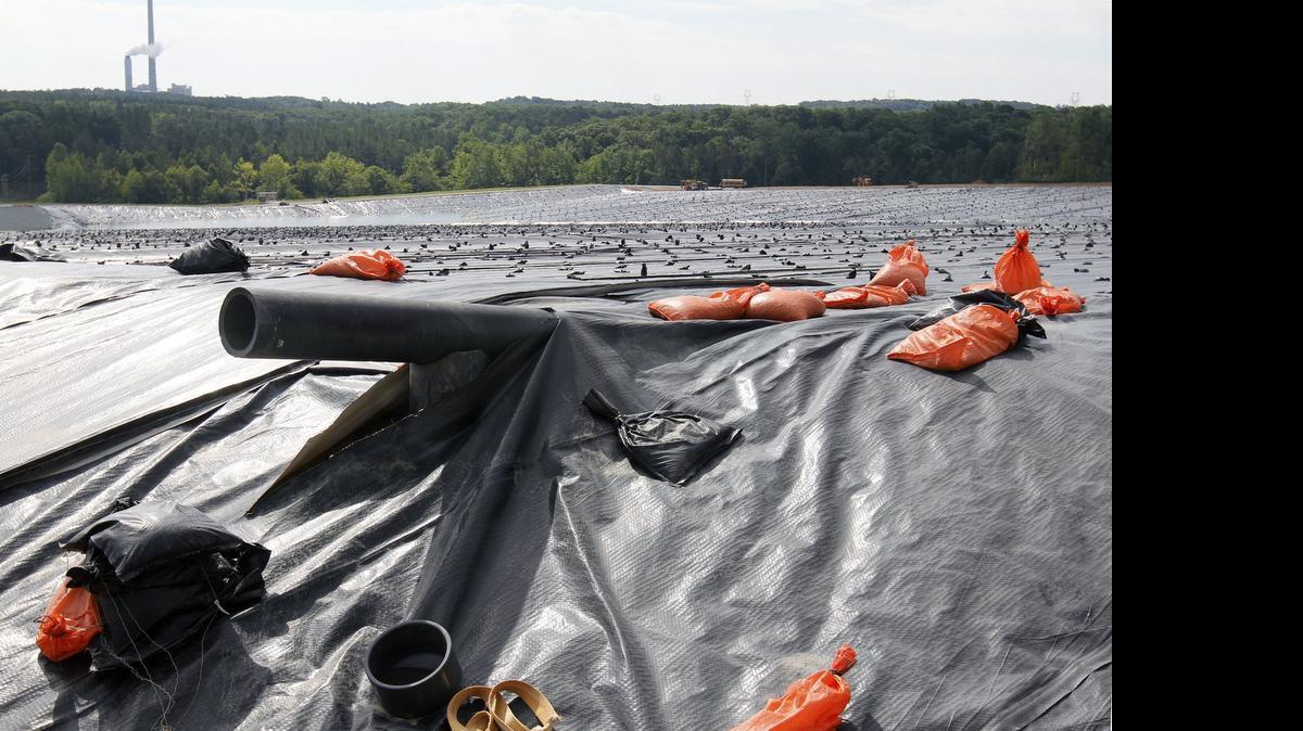 
A large-diameter leachate pipes rise up at the lip of the state-of-the-art lined coal ash landfill in Person County, NC. Chatham County has agreed to host a similar landfill for Duke Energy in exchange for $19 million, which the county will use for environmental monitoring and possibly for catastrophic insurance.
