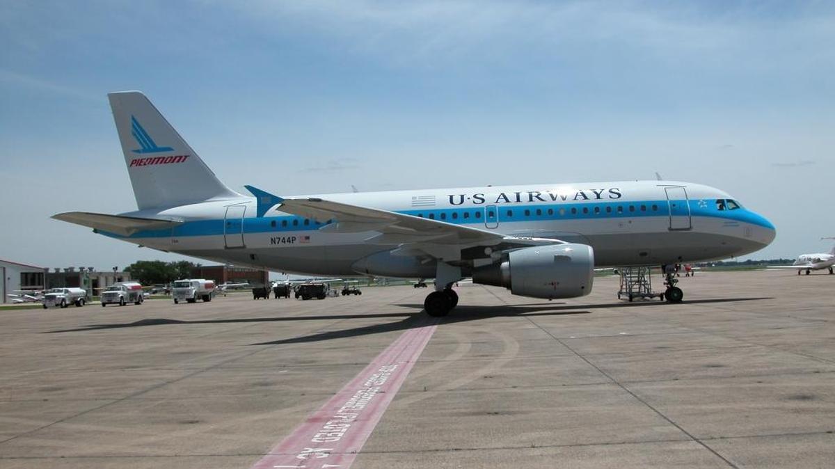 A USAirways Airbus A319 painted to salute the heritage of Piedmont Airlines, one of the predecessor airlines that made up US Airways – which is now American Airlines. Observer file photo.
