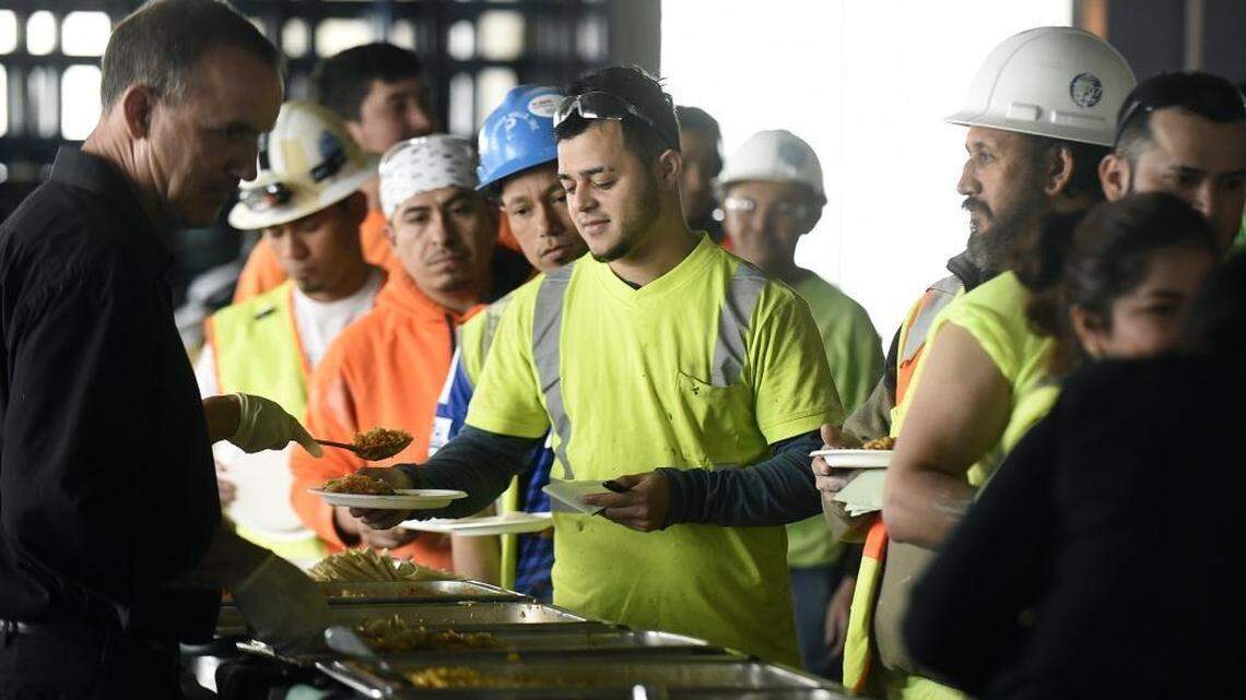 Construction on the Museum Tower apartments took a brief break as employees were treated to a lunch on the 35th floor on Friday, Mar. 11, 2016 to celebrate the fast-approaching topping out.