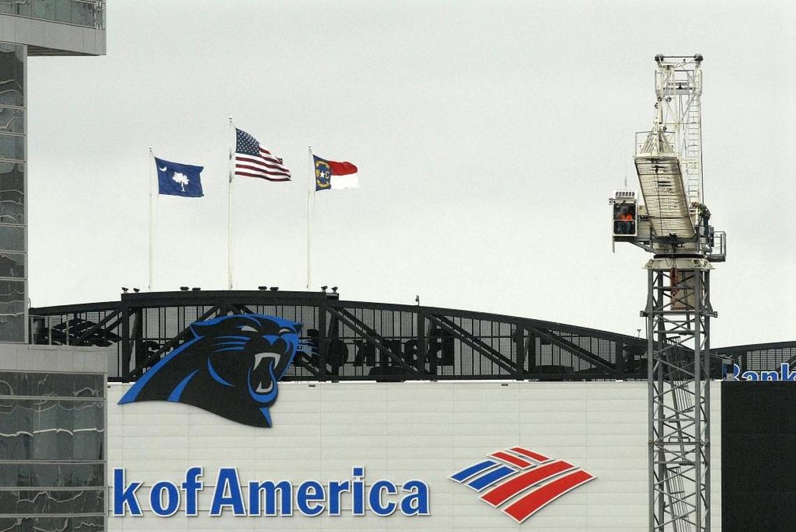 A tower crane at the site of the former Charlotte Observer building, a block from Bank of America Stadium.