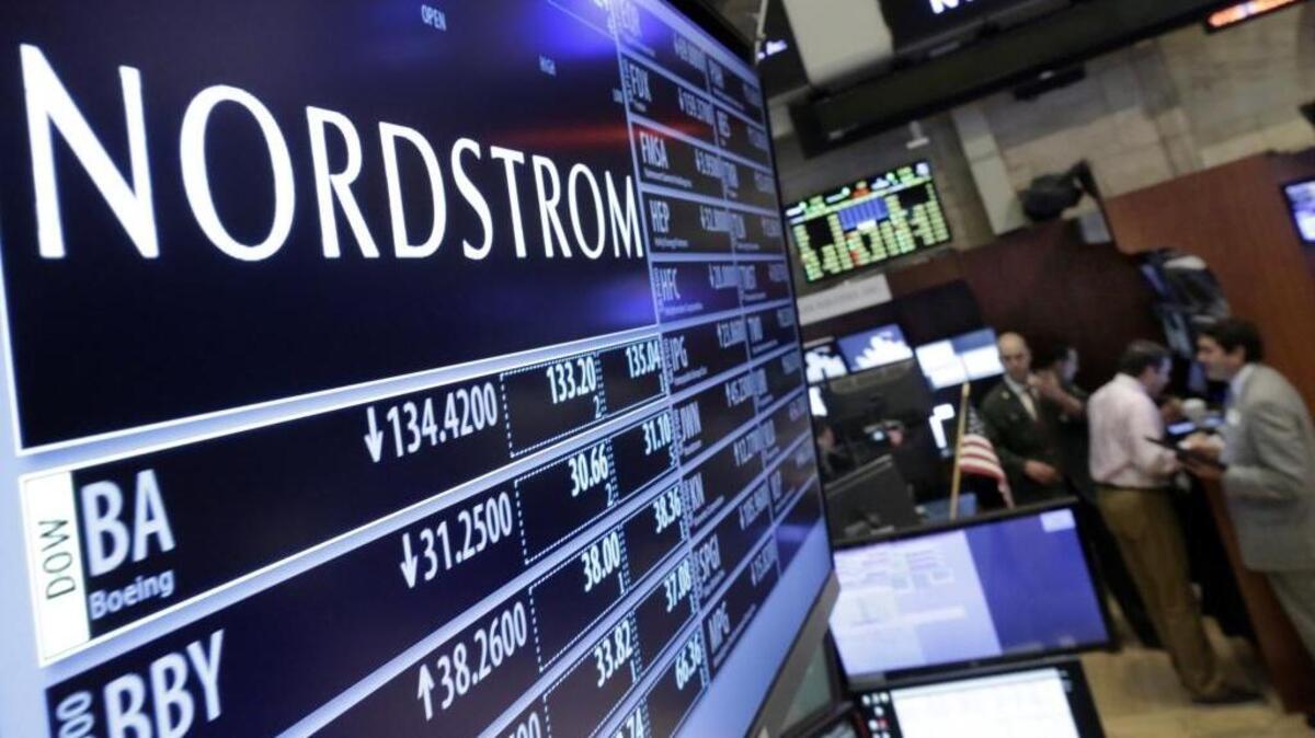 FILE - In this May 13, 2016 file photo, the Nordstrom logo is displayed above the post where it trades on the floor of the New York Stock Exchange in New York.
